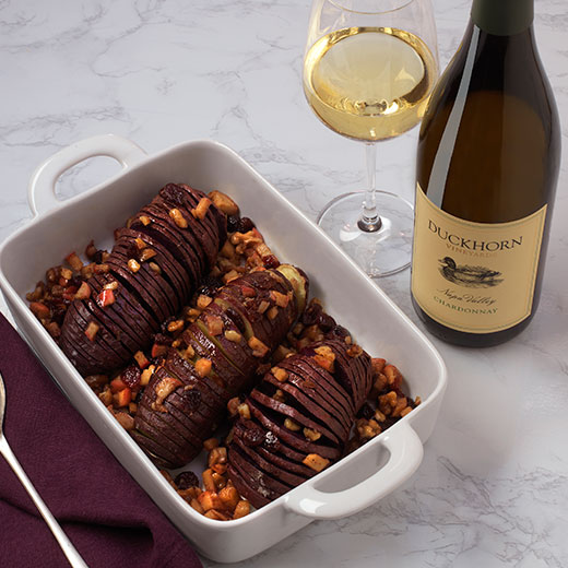 Hasselback Sweet potatoes with a glass of Duckhorn Chardonnay