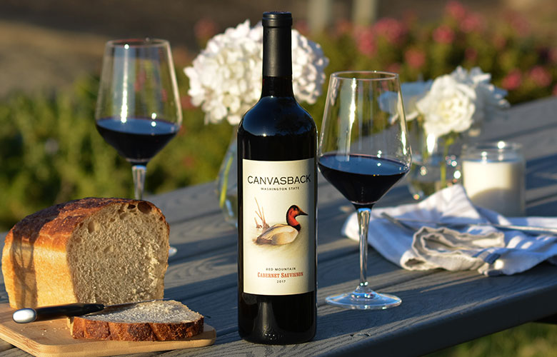 Canvasback bottle on a picnic table