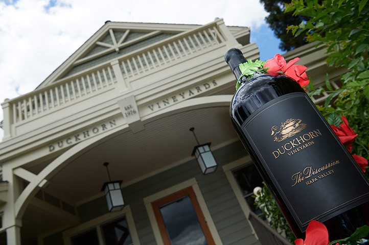 Discussion etched wine bottle in front of Duckhorn front entrance door