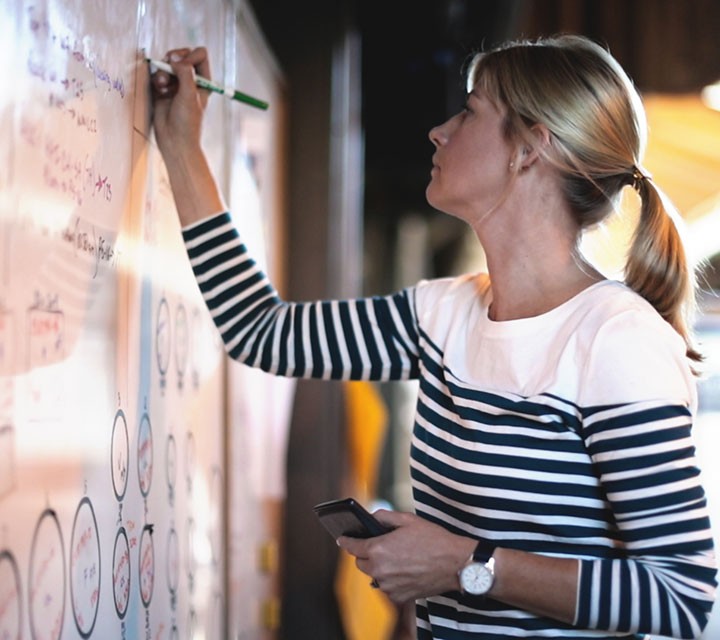 winemaker Renée Ary writing on a white board